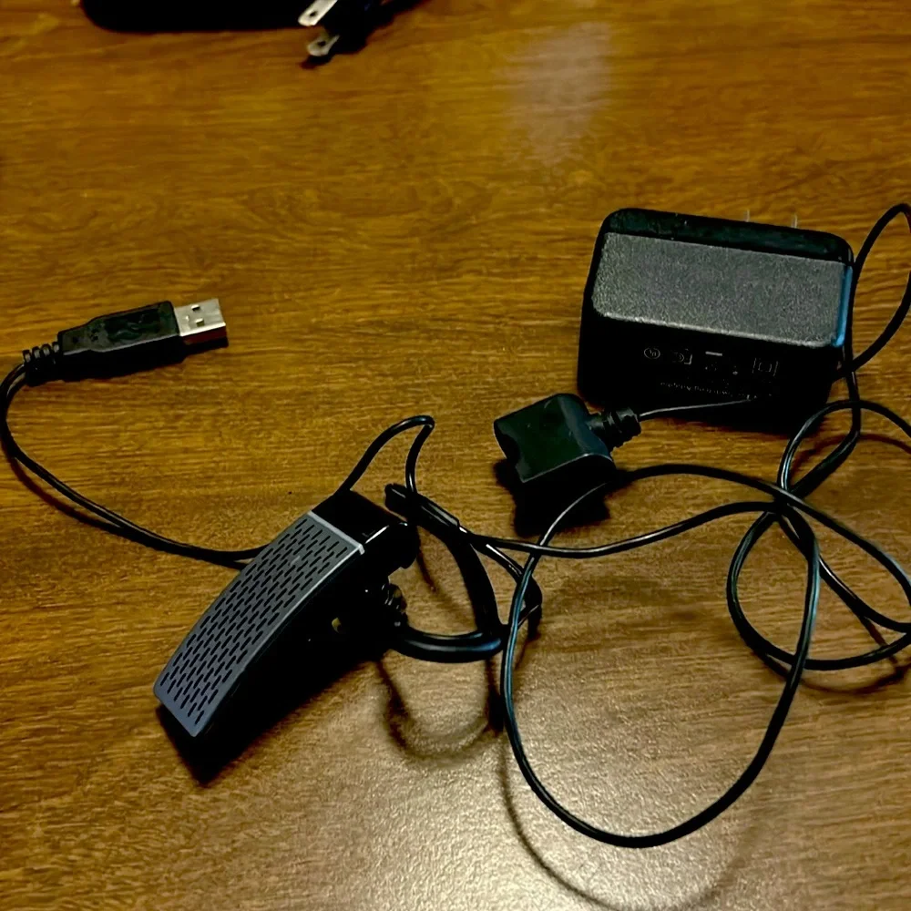 Jawbone Bluetooth earbud and charger